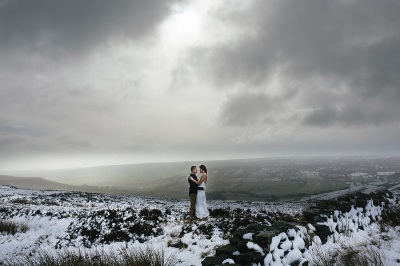 Bride and Groom eloping in the snow